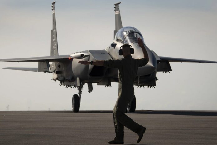 1772084195-032b2cc936860b03048302d991c3498f চীনের সামরিক বাহিনীকে প্রশিক্ষণ, মার্কিন এলিট পাইলট গ্রেফতার