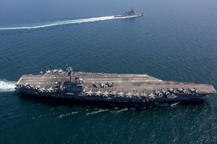 1772375953-efa9ec65918f971c9130a9d5ccfa272f যুদ্ধবিমানবাহী মার্কিন রণতরি আব্রাহাম লিংকনে হামলার দাবি ইরানের