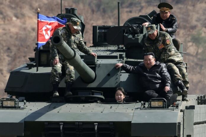 1774019071-e5dc5ab29e4b7fa057074aa9200f0734 সামরিক মহড়ায় ট্যাঙ্ক চালালেন কিম জং উনের কন্যা