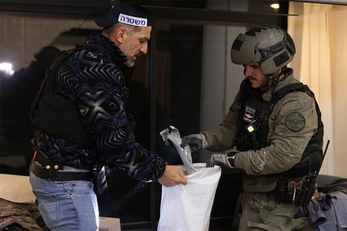 1774118859-fe5df232cafa4c4e0f1a0294418e5660 ইরানের ক্ষেপণাস্ত্র হামলায় ইসরায়েলে ভবন ধস, আহত অন্তত ২০