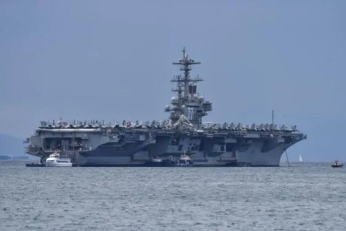 1774692647-94855b5d6da353631d580dd6edb6977c উত্তেজনা বাড়িয়ে মধ্যপ্রাচ্যের পথে বিশাল মার্কিন বিমানবাহী রণতরী